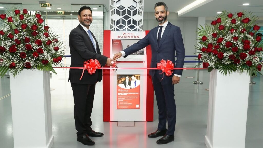 RAKBANK Business Banking Managing Director Dhiraj Kunwar (left) and Anas Hijjawi, RAKEZ Chief Commercial Officer, during the opening of RAKBANK’s Quick Apply digital kiosk at RAKEZ Service Centre – Al Hamra.